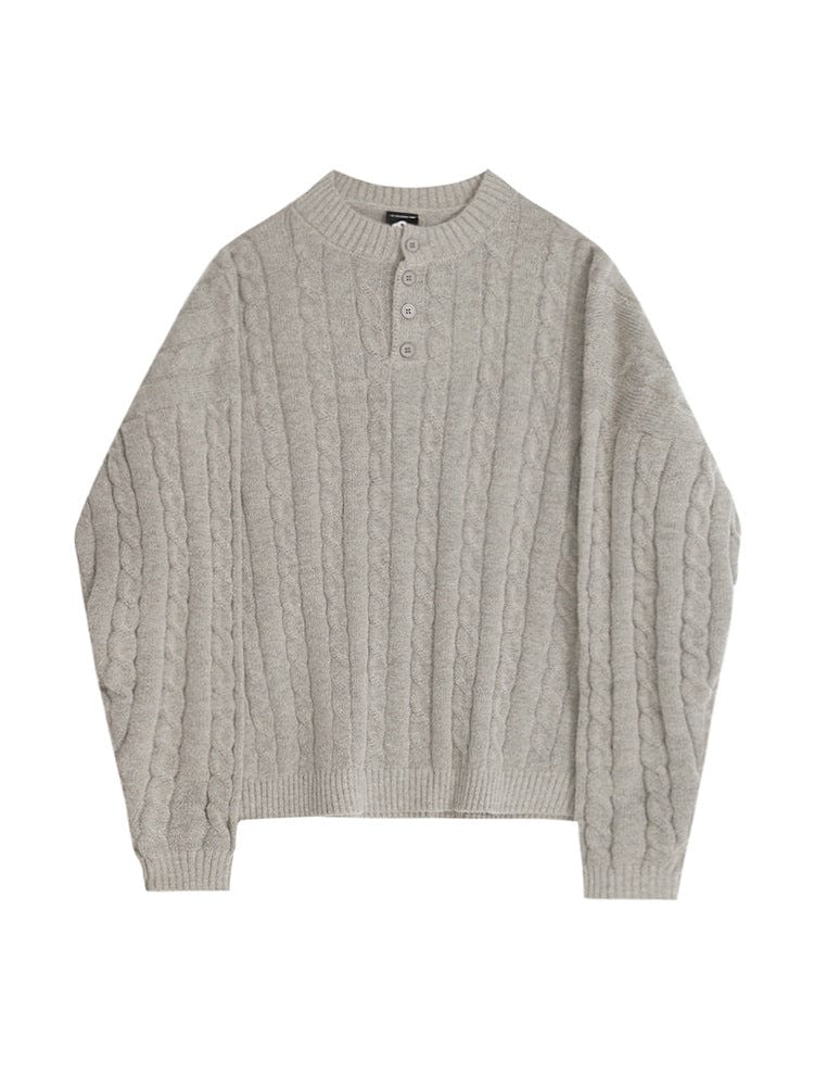 Henley sweater with button collar, ribbed sleeves, and knit texture