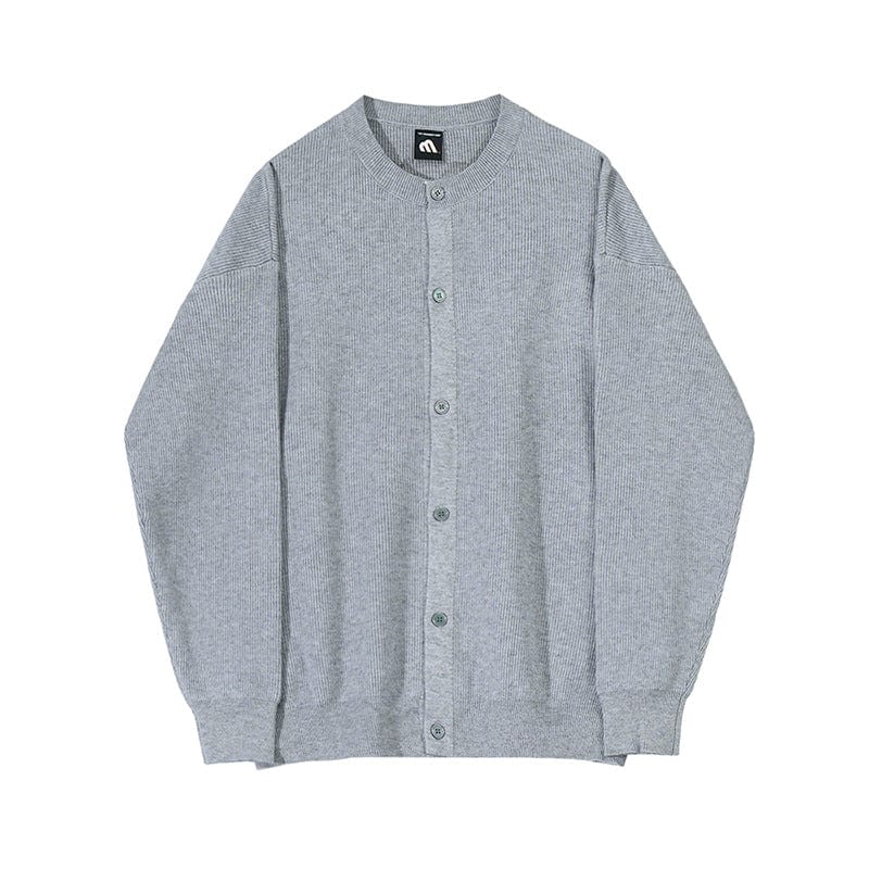 Men’s cardigan with circular neckline, ribbed hem, and long sleeves, laid flat