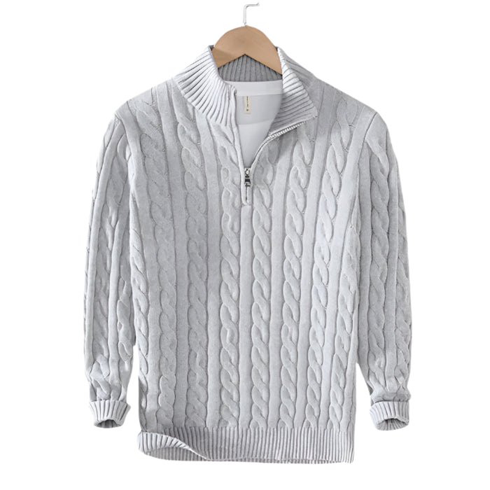 Hanger view of half-zip sweater with straight seams and clean neckline
