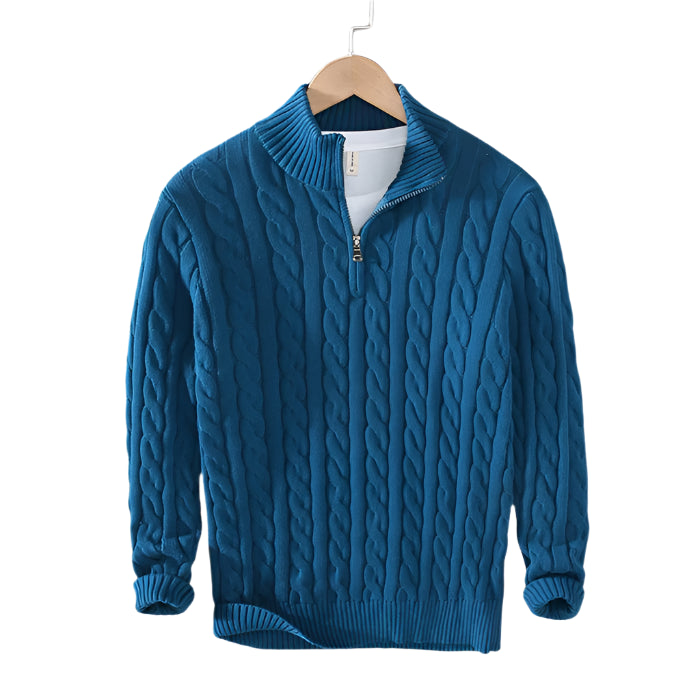 Pullover with zip front and long sleeves, shown on hanger