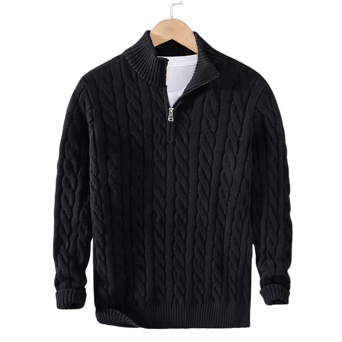 Sweater with front zipper and ribbed edges, hanging on display