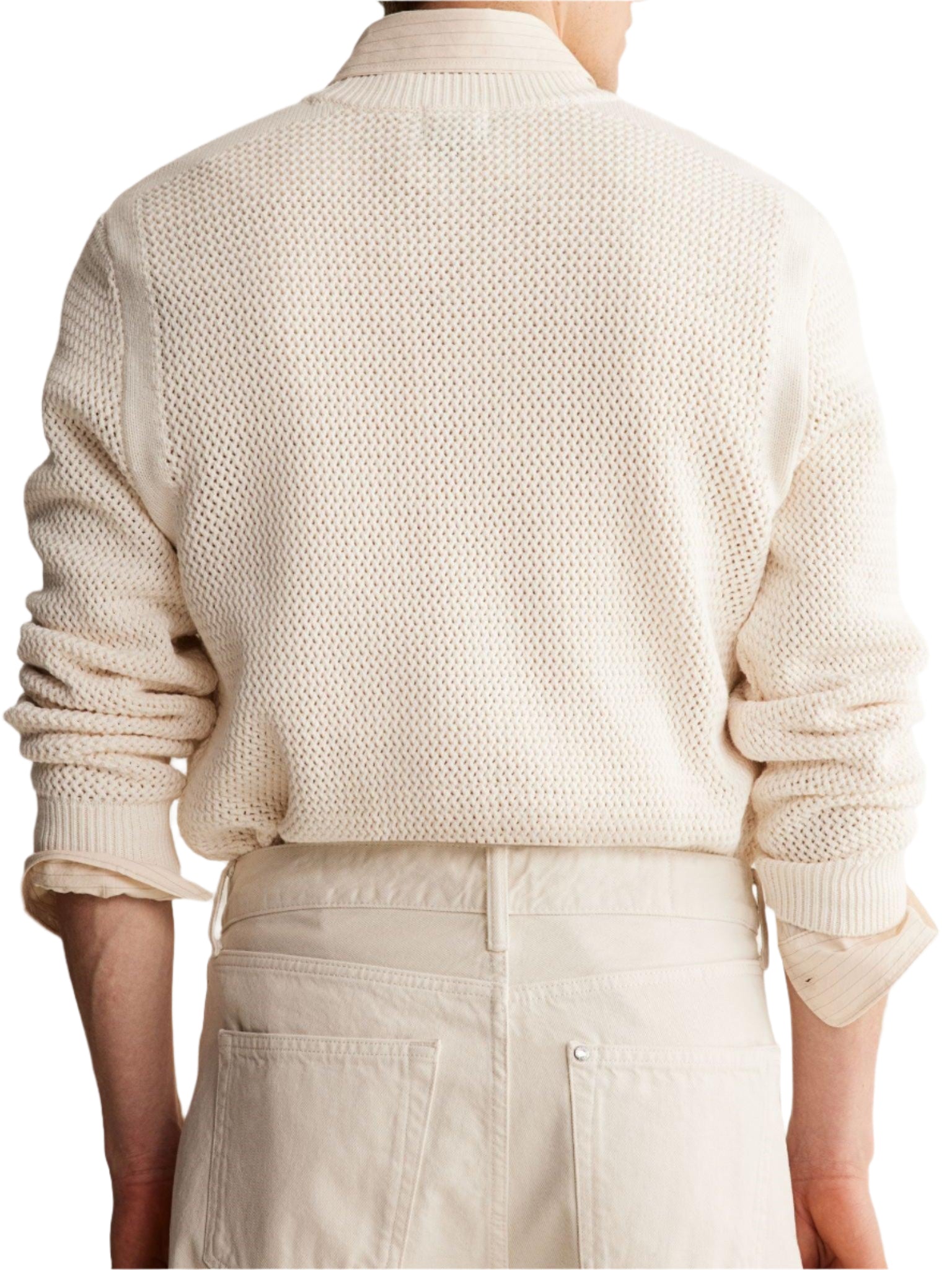 Men’s pullover with visible knit pattern and long sleeves, worn by model