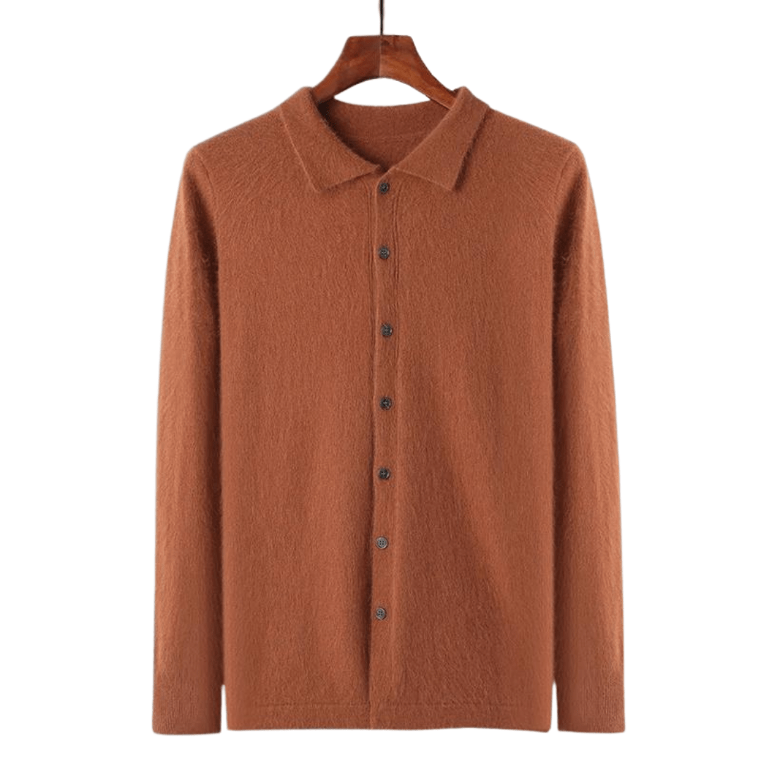 Knit shirt with button placket and long sleeves, displayed on hanger