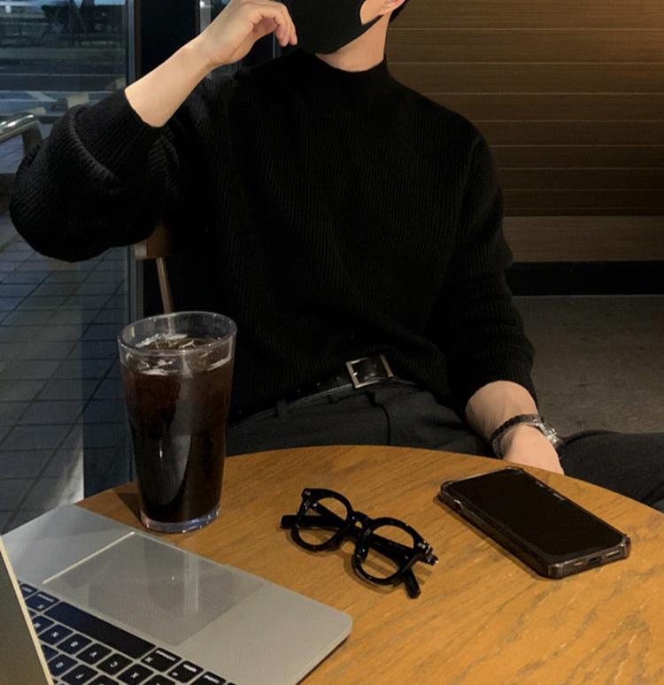 Half turtleneck sweater with knit surface and long sleeves, worn by model