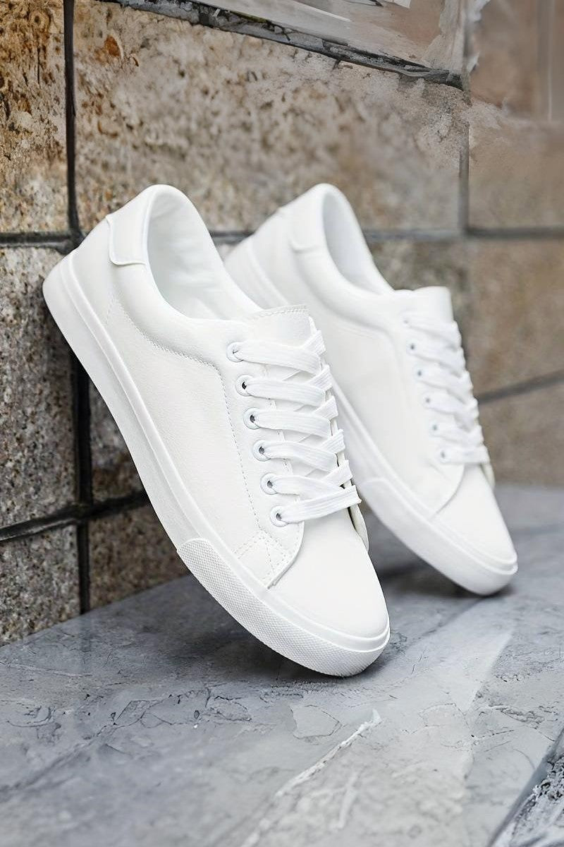 casual sneakers with reinforced toe and stitched upper