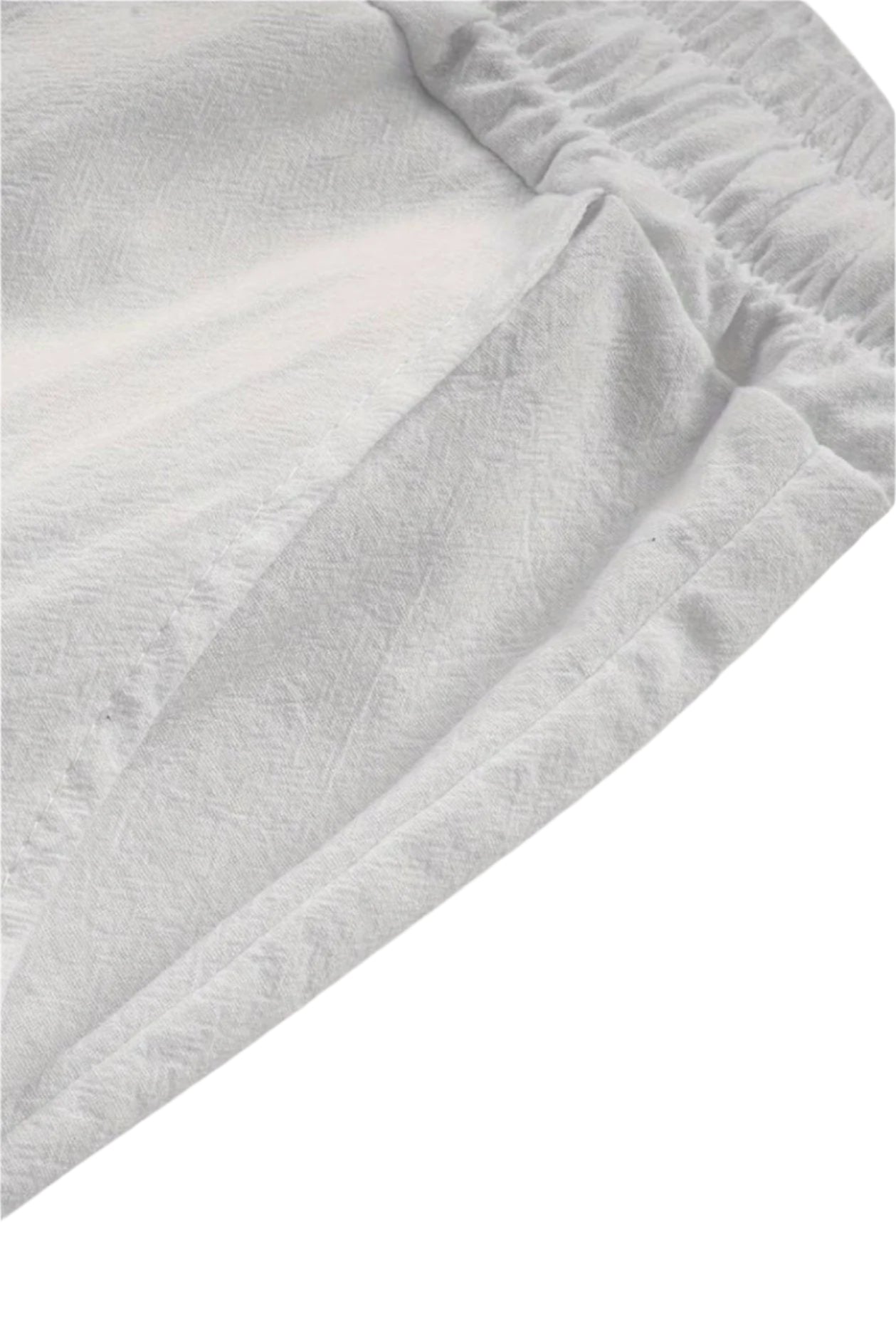 Trousers with zip closure and straight leg design, laid flat