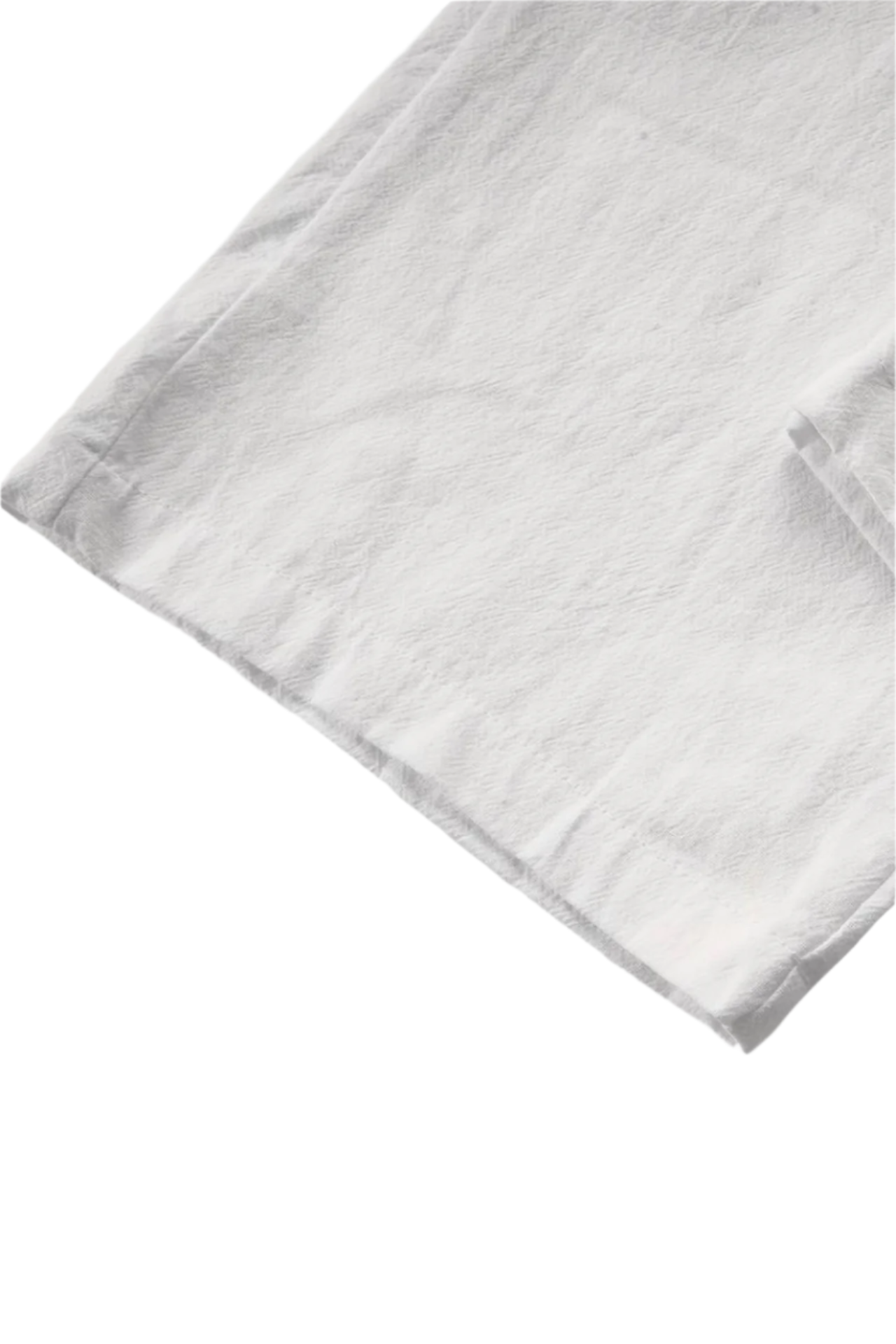 Flat-lay of trousers with side seam pockets and structured waistband