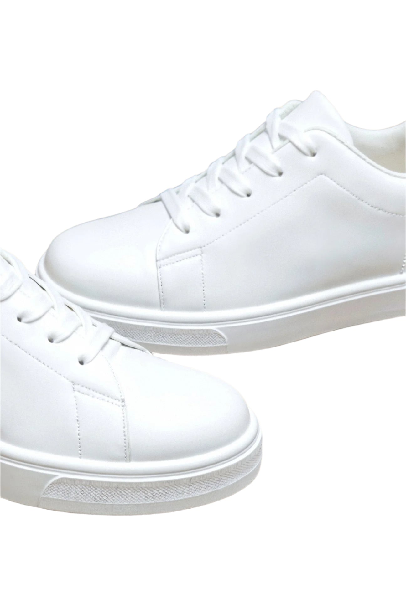 Sneakers with rounded toe, reinforced panels, and flat sole, displayed flat