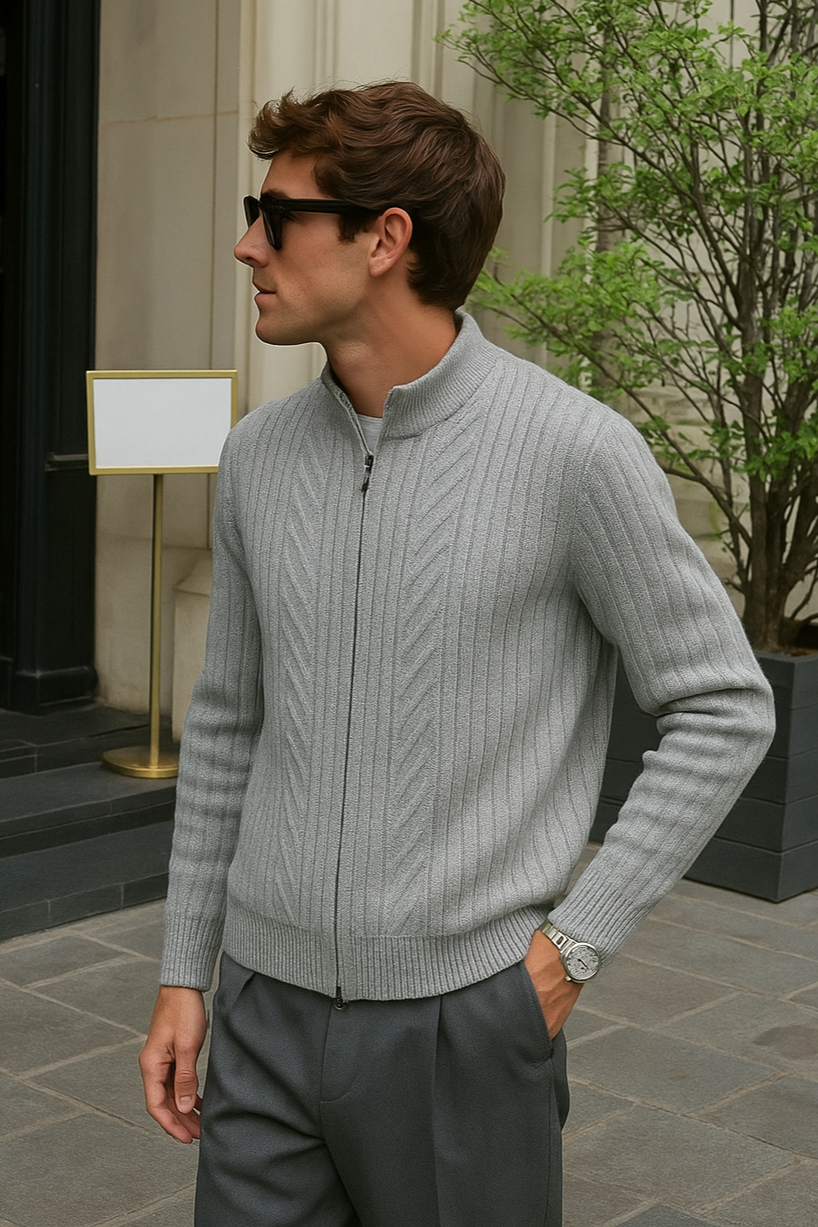 Model wearing men’s quarter zip sweater with long sleeves and ribbed edges