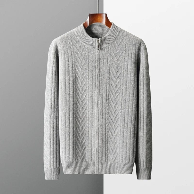 Pullover sweater with front zip and long sleeves, shown on hanger