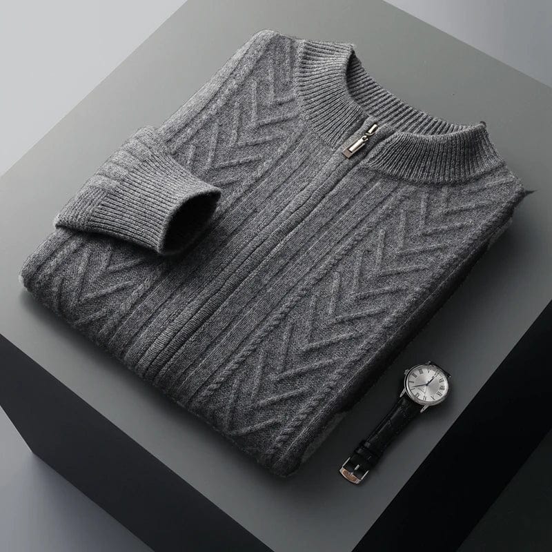 Quarter zip pullover with ribbed hem, displayed flat on surface