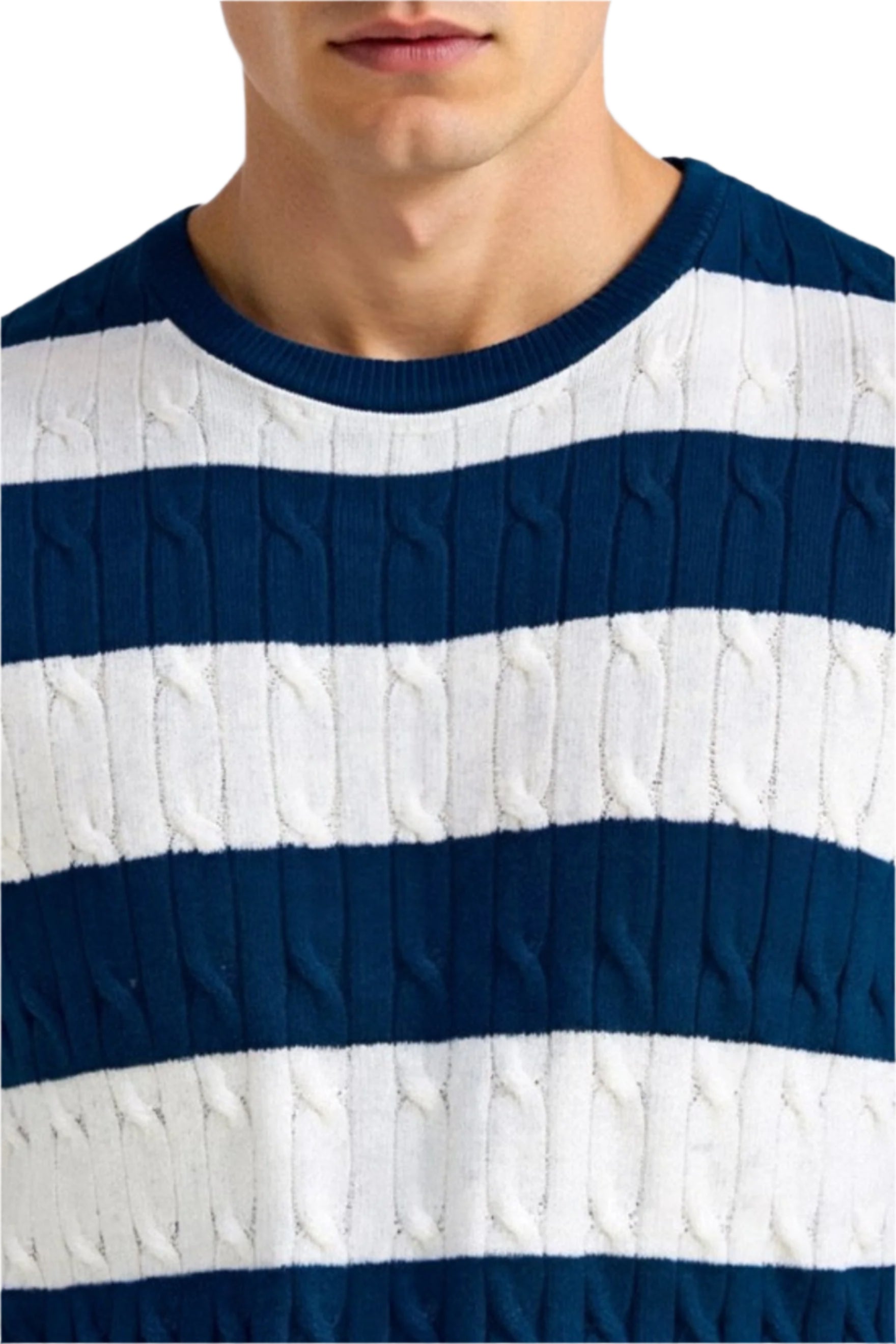 Model wearing striped short sleeve knit top with ribbed hem