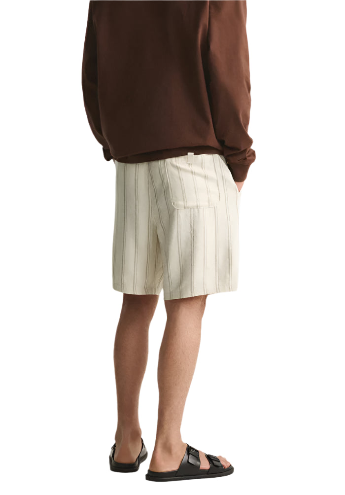 Men’s shorts with button front and belt loops, shown on model