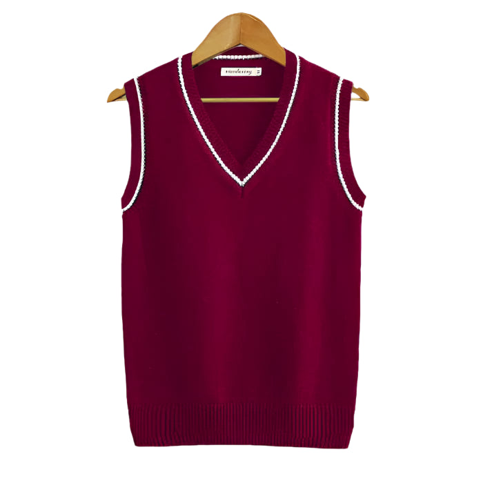 Sleeveless top with structured knit and simple neckline, displayed on hanger