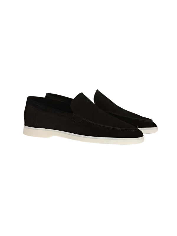 Men’s loafers with flat base and slip-on construction, displayed flat