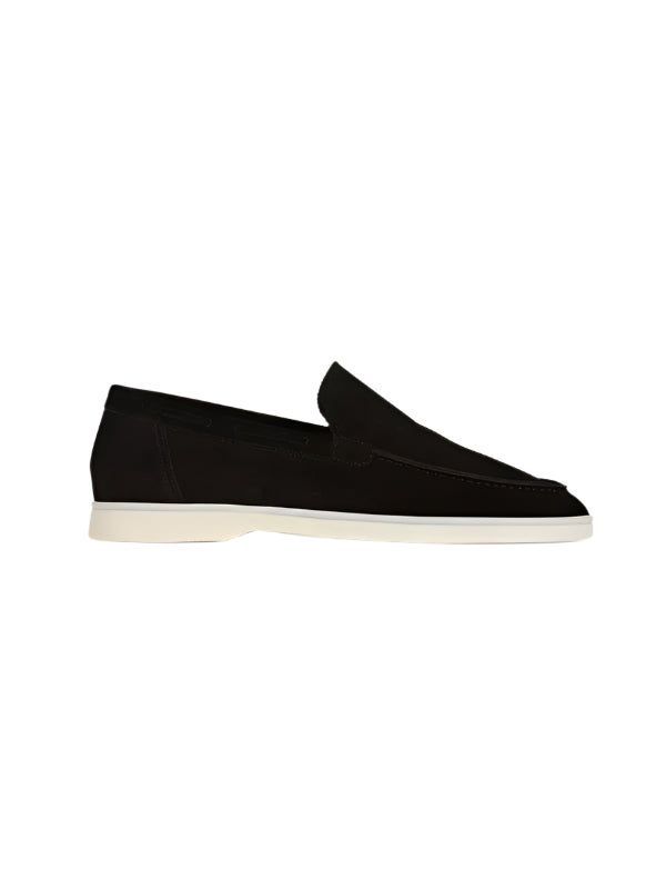 Slip-on loafers with low-cut opening and rounded toe, laid flat
