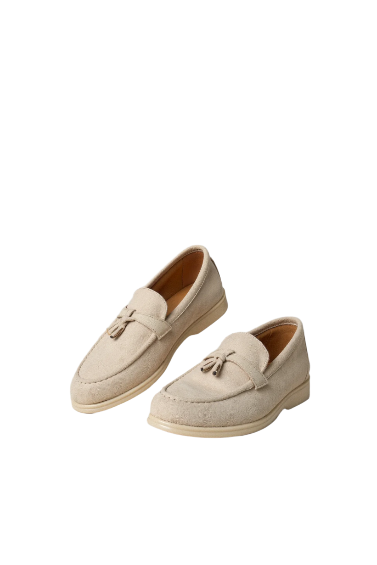 Neutral-tone slip-on loafers laid flat showing side profile