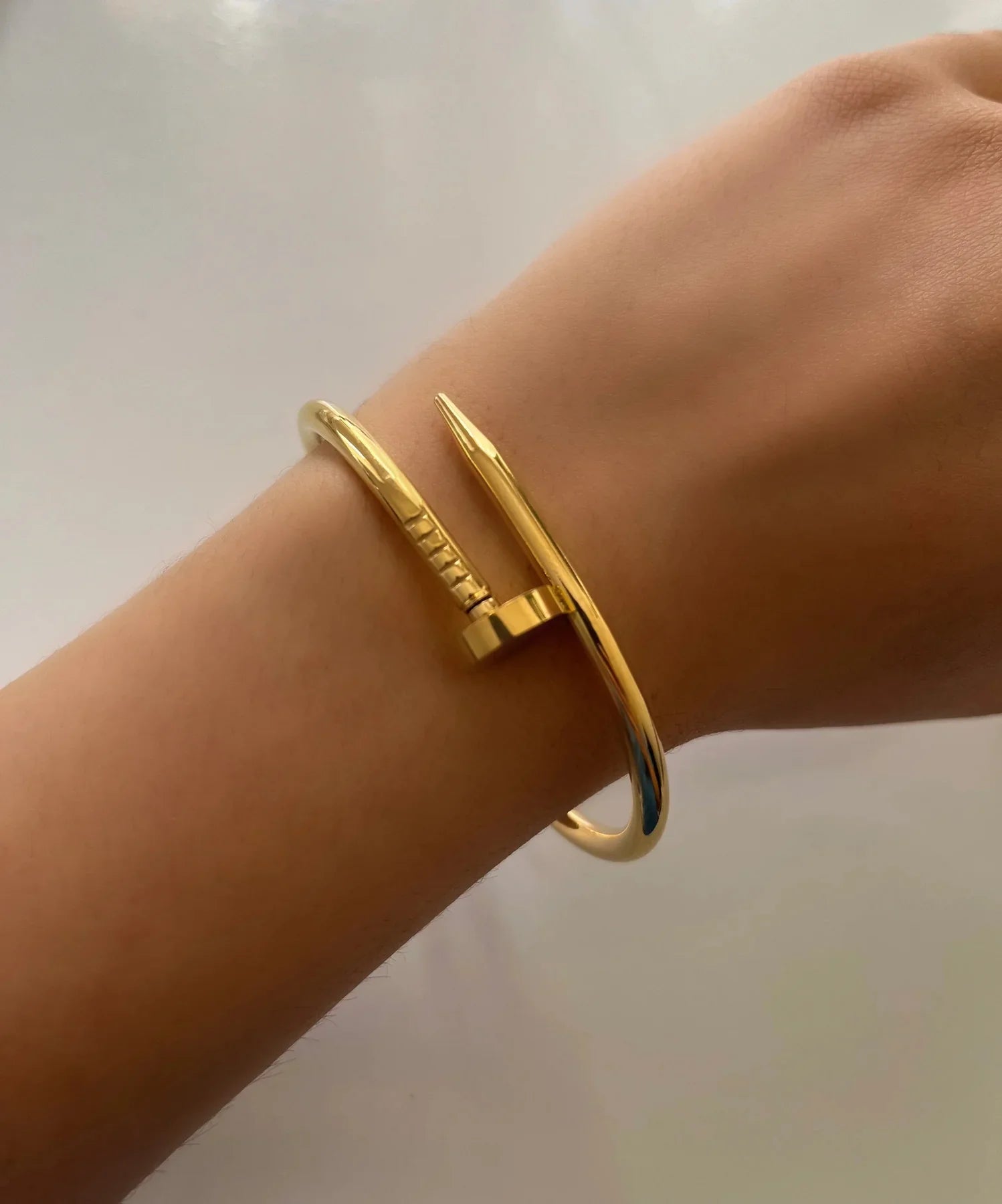 Men’s spike bracelet with curved structure, shown on wrist