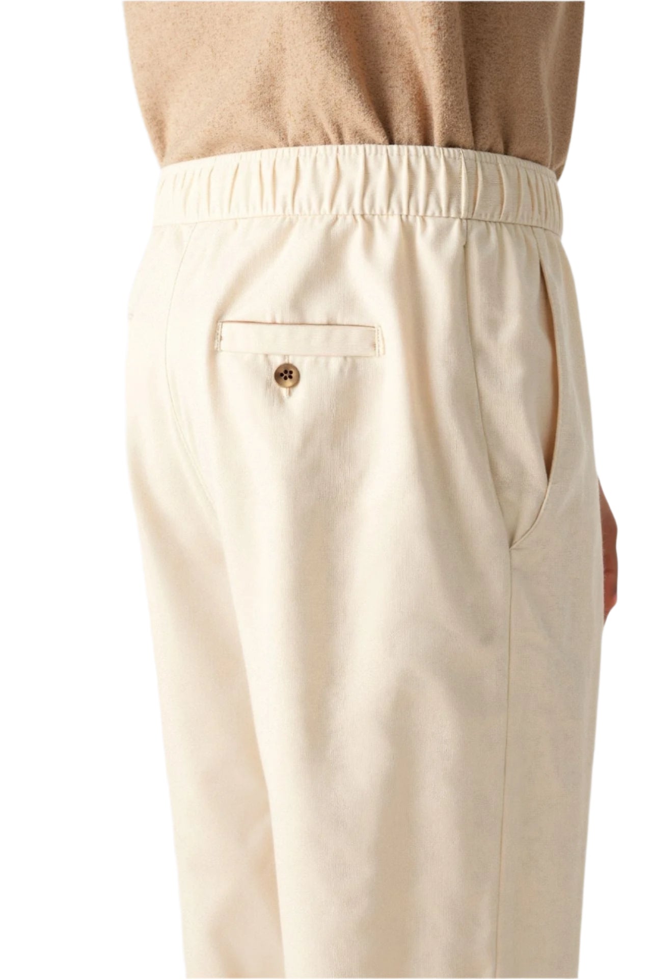 Model wearing straight leg pants with side pockets and clean hemline