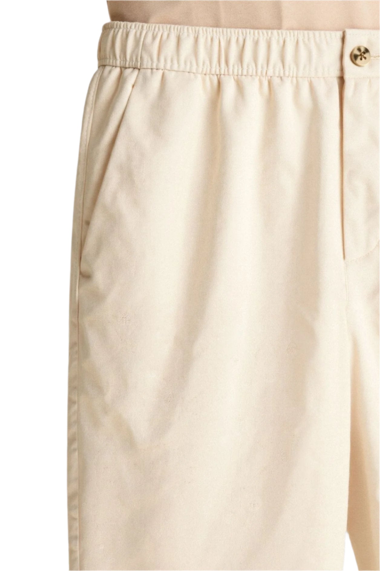 Flat-lay of trousers with waistband, zip front, and straight hem