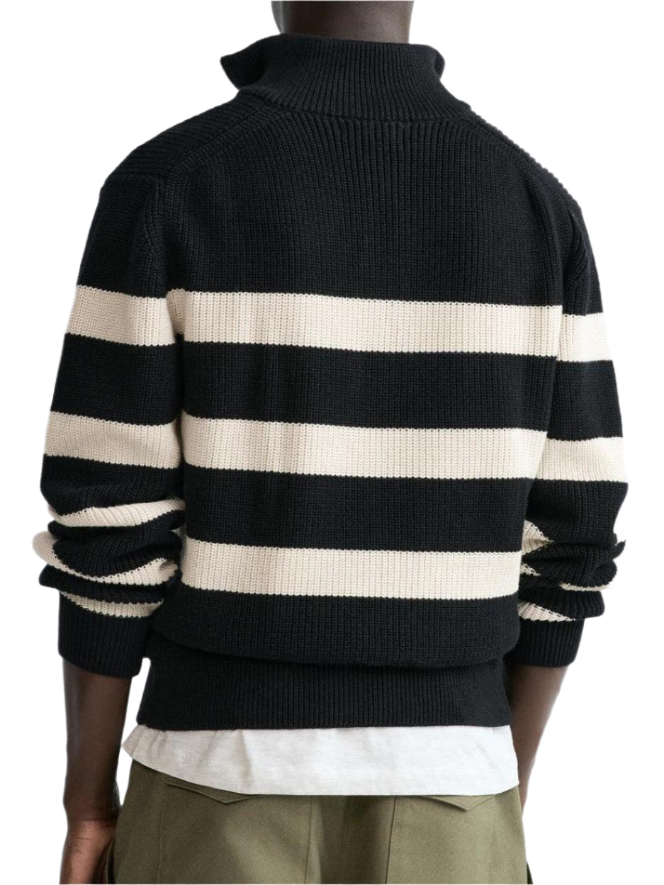 Pullover sweater with front zipper and horizontal stripes, worn by model
