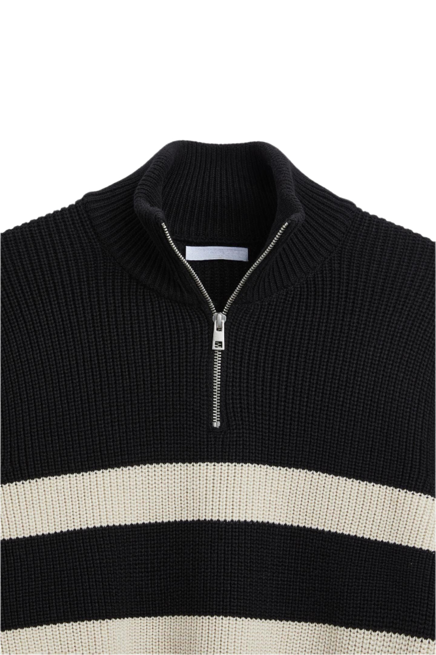 Sweater with front zipper and bold stripe pattern, laid flat