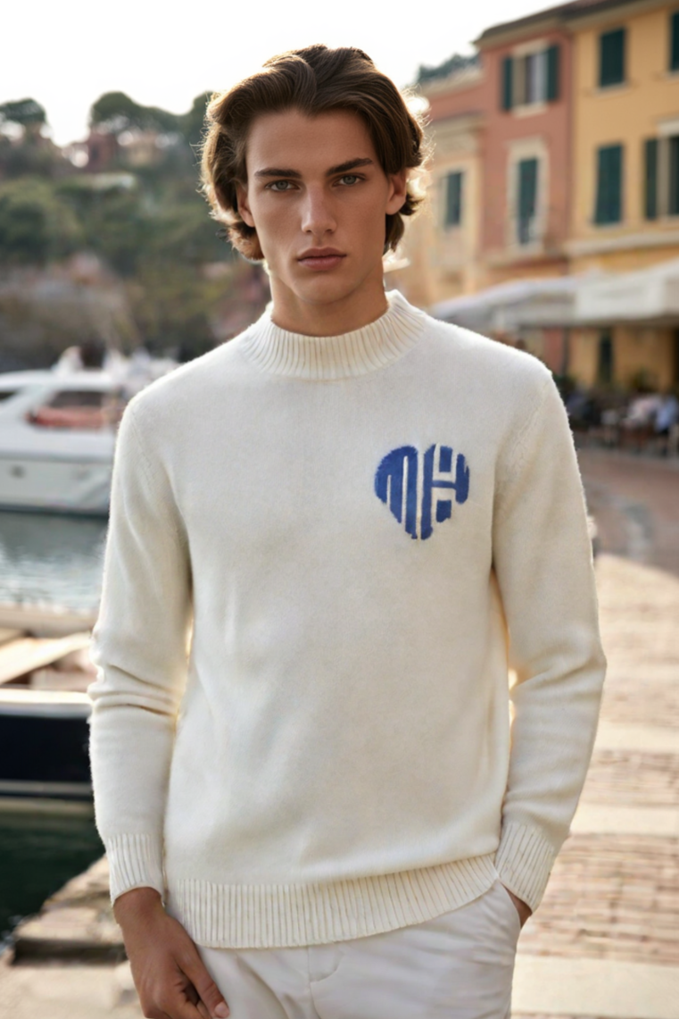 Model wearing sweater with ribbed cuffs and long sleeves