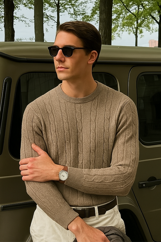Model wearing textured sweater with long sleeves and ribbed cuffs