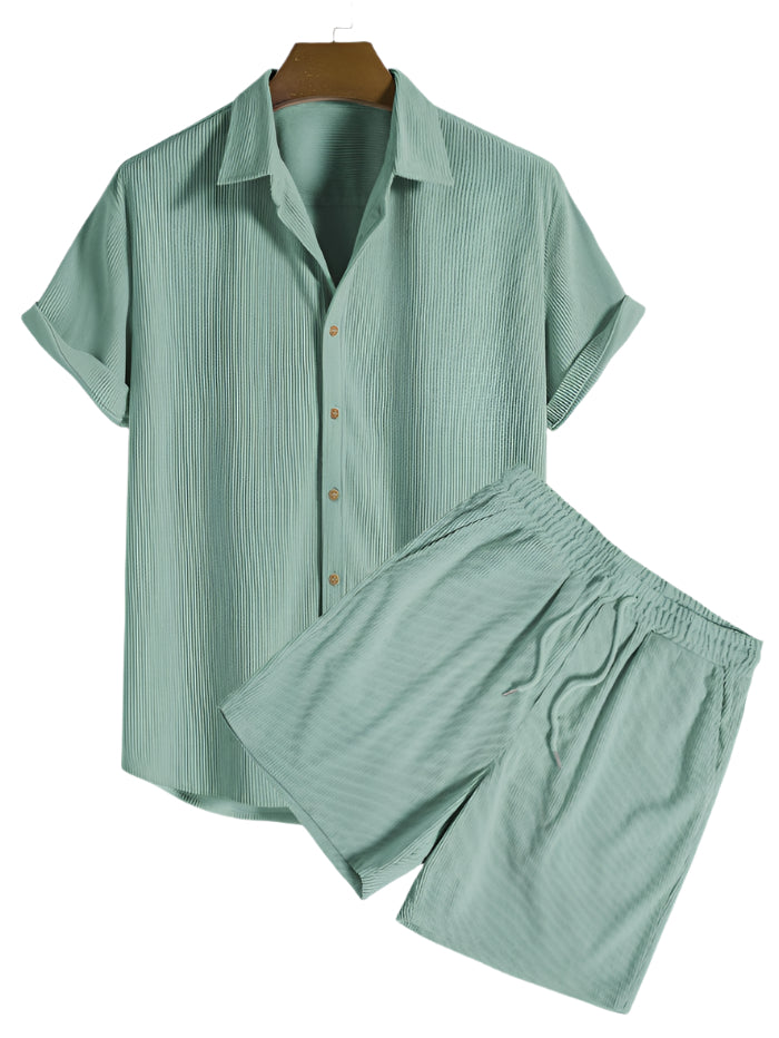 Flat-lay of collared shirt with buttons and elastic waist shorts