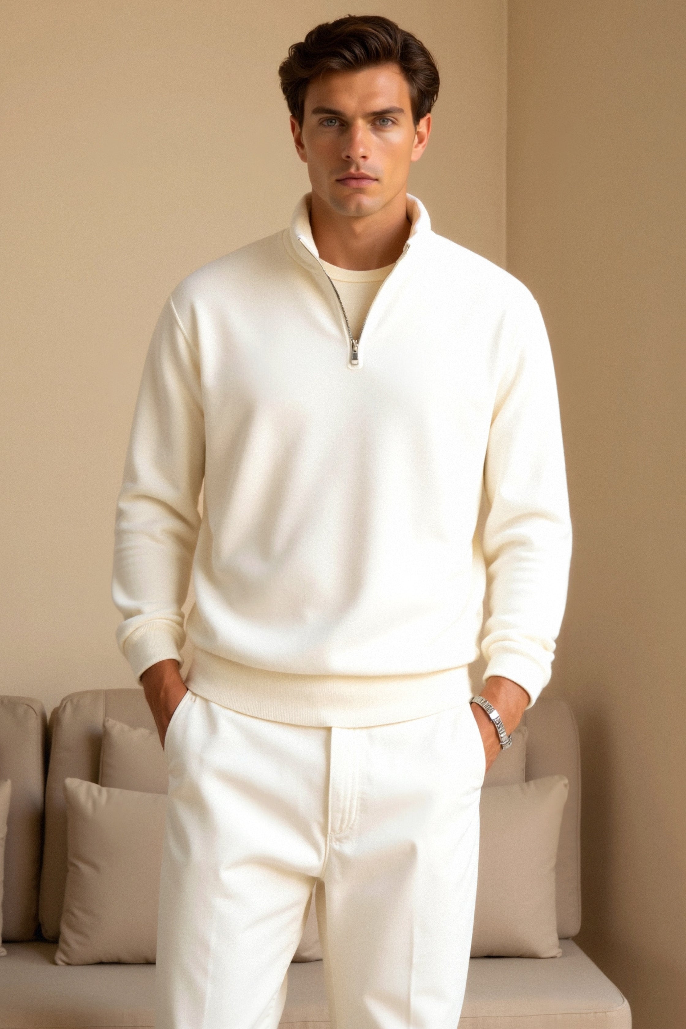 Men’s front-zip pullover with long sleeves and fitted cuffs, worn by model