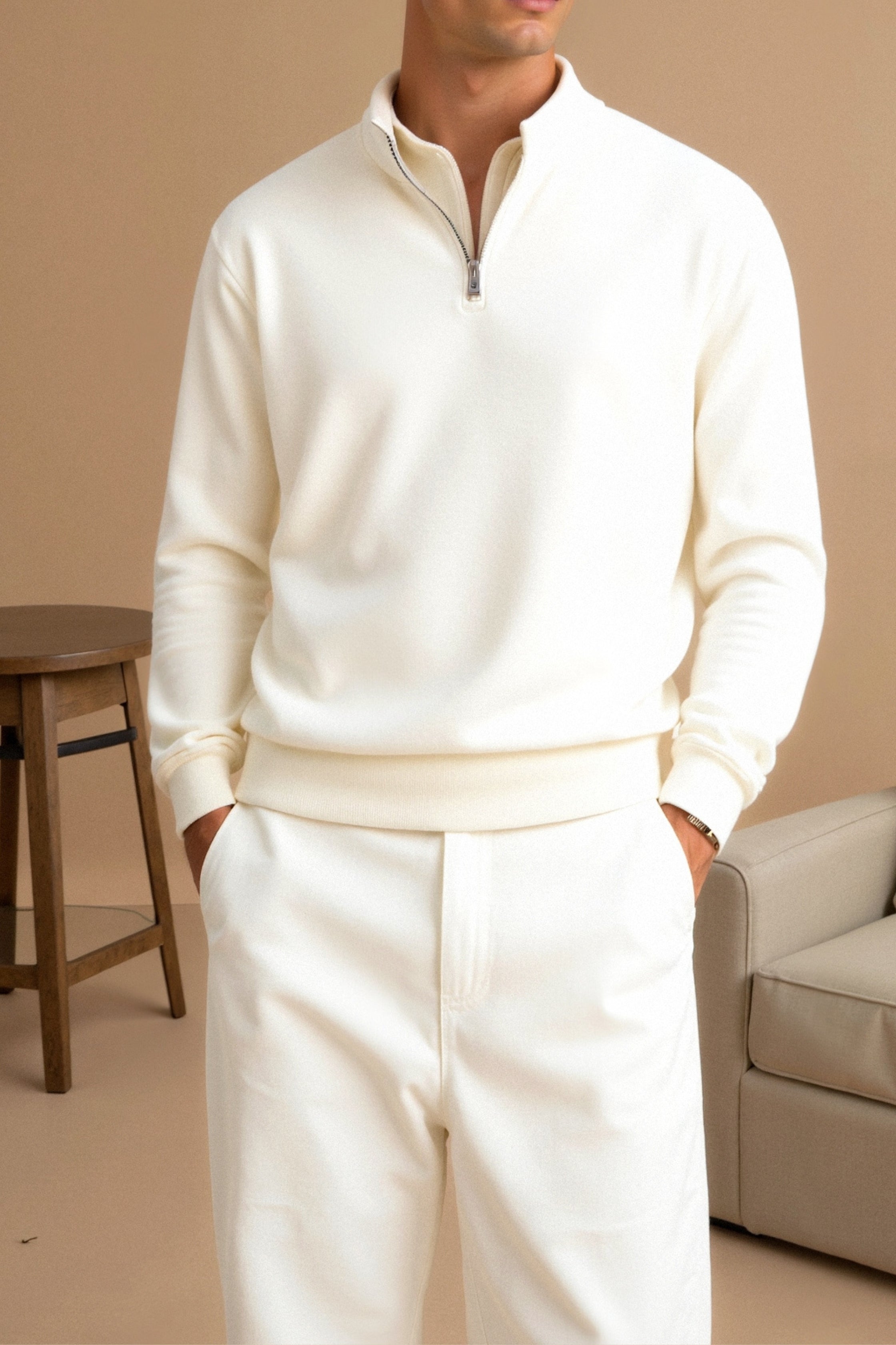 Zip sweater with structured hem and clean silhouette, worn by model