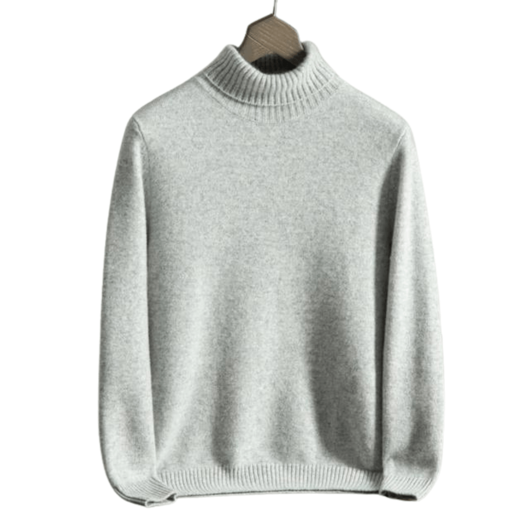 Turtleneck sweater with ribbed cuffs and long sleeves, displayed on hanger