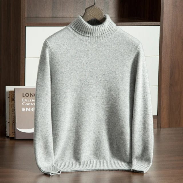 Turtleneck sweater with ribbed cuffs and long sleeves, displayed on hanger